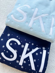 Icy Blue Ski Snowflake Sweatshirt