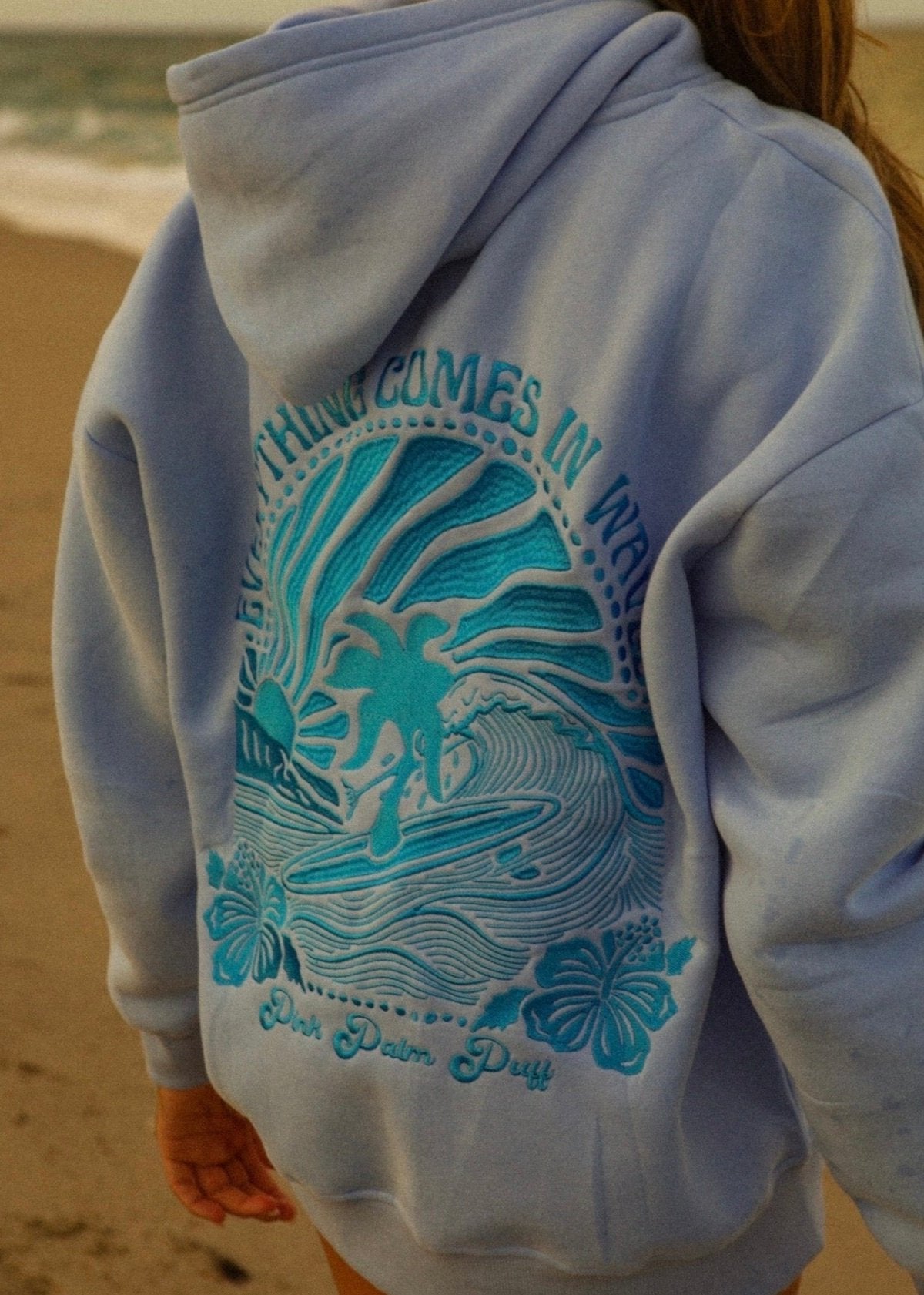 "Everything Comes in Waves” Hoodie in Blue